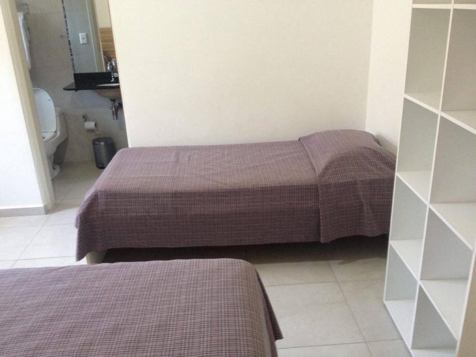 Pousada Parque Suites Estacionamento E Piscina Guaruja Room photo