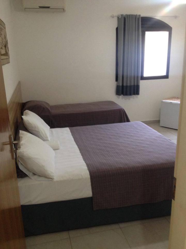 Pousada Parque Suites Estacionamento E Piscina Guaruja Room photo